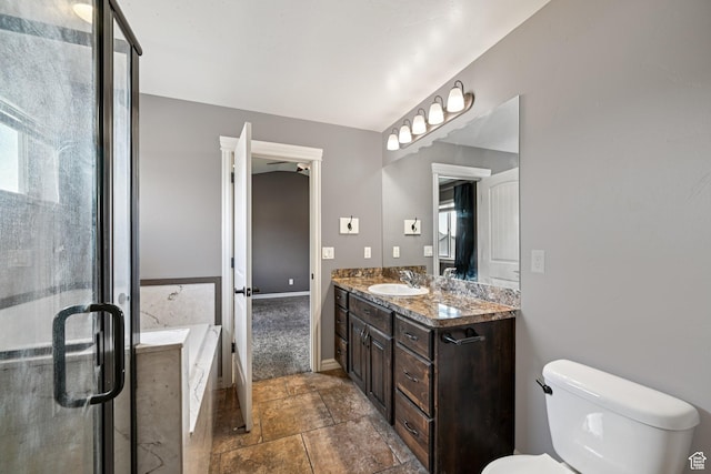 885 W 2150 N, Pleasant View, UT 84404 - bathroom with vanity, a garden tub, a stall shower, and stone finish floors