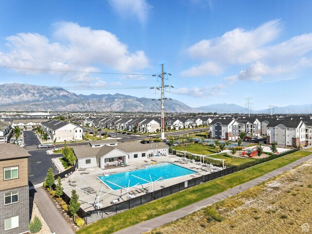 523 N 310 W, Vineyard, UT 84059 - community pool featuring a residential view, a mountain view, and a patio area
