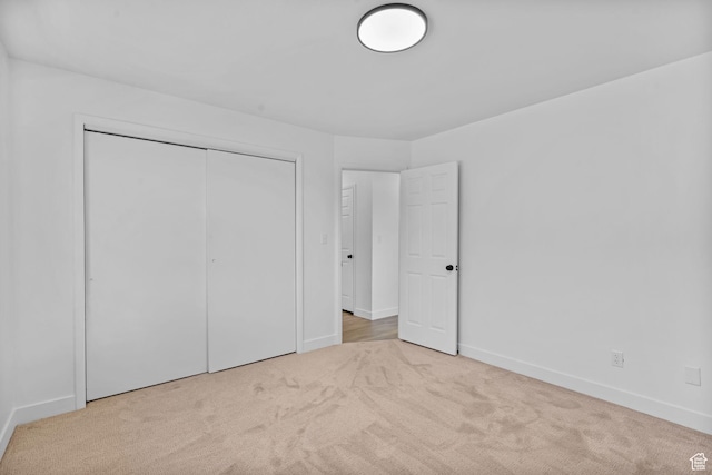 1455 N Amiron Way Unit D, Orem, UT 84057 - unfurnished bedroom featuring carpet and a closet