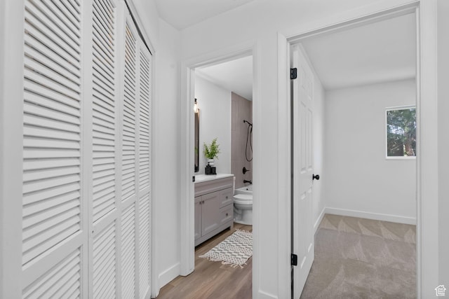 1455 N Amiron Way Unit D, Orem, UT 84057 - hallway with baseboards and wood finished floors
