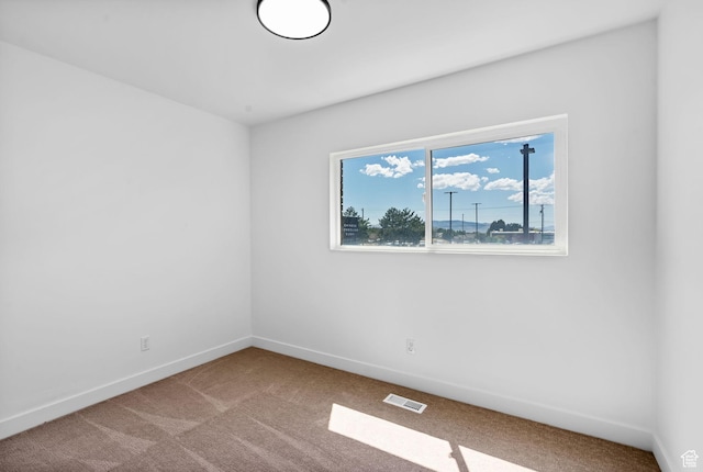 1455 N Amiron Way Unit D, Orem, UT 84057 - carpeted spare room featuring baseboards