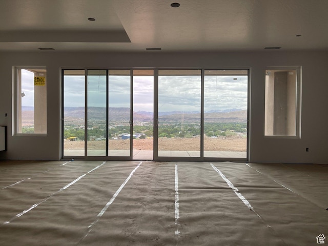 575 S 1800 W, Hurricane, UT 84737 - unfurnished room with a mountain view and a tray ceiling