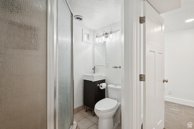 223 E 100 N, Bountiful, UT 84010 - bathroom with a textured ceiling, vanity, a shower stall, and tile patterned flooring