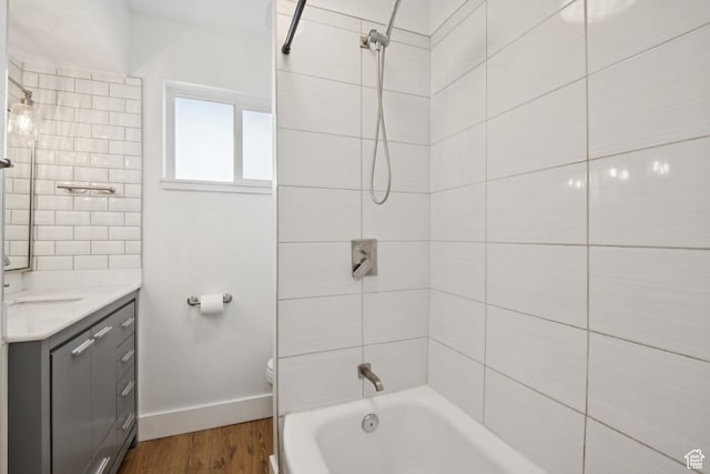 223 E 100 N, Bountiful, UT 84010 - bathroom featuring vanity, wood finished floors, and washtub / shower combination
