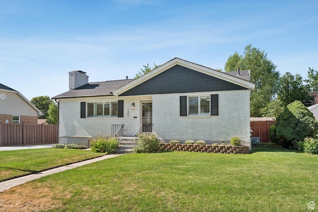 223 E 100 N, Bountiful, UT 84010 - ranch-style home with brick siding and a chimney