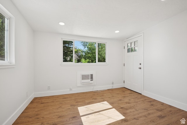 223 E 100 N, Bountiful, UT 84010 - spare room with wood finished floors, recessed lighting, and a wall mounted AC