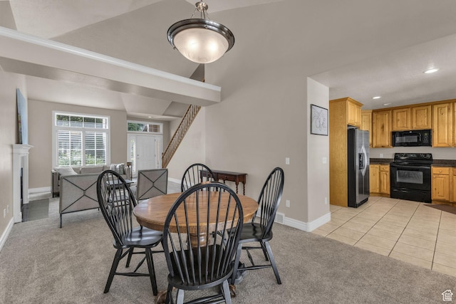1082 E 370 N, American Fork, UT 84003 - dining area featuring light colored carpet, stairs, recessed lighting, and light tile patterned floors