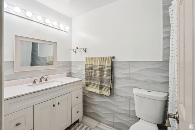 9355 S Peruvian Dr E, Sandy, UT 84093 - half bath with tile walls, vanity, and backsplash