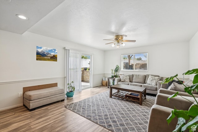 9355 S Peruvian Dr E, Sandy, UT 84093 - living room featuring wood finished floors, ceiling fan, and recessed lighting