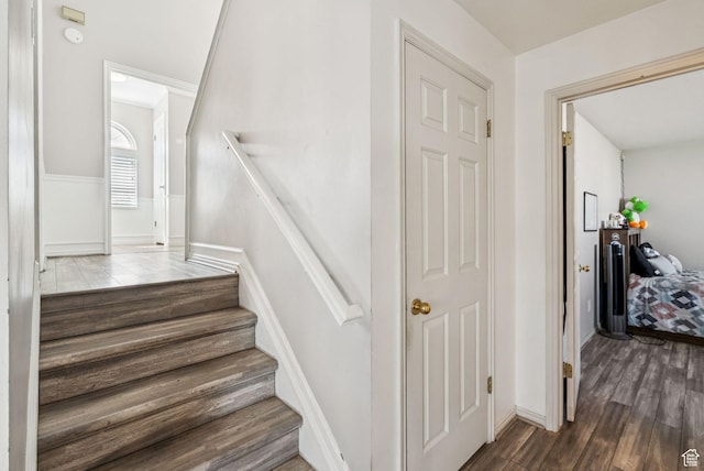 9355 S Peruvian Dr E, Sandy, UT 84093 - stairs featuring wood finished floors and baseboards
