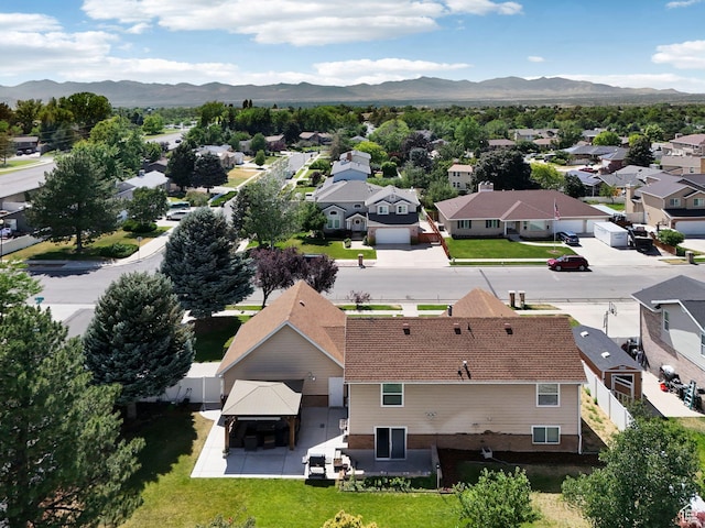 9355 S Peruvian Dr E, Sandy, UT 84093 - aerial view of residential area with a mountainous background