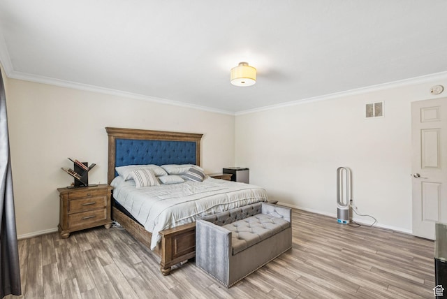 9355 S Peruvian Dr E, Sandy, UT 84093 - bedroom with ornamental molding and light wood-style flooring