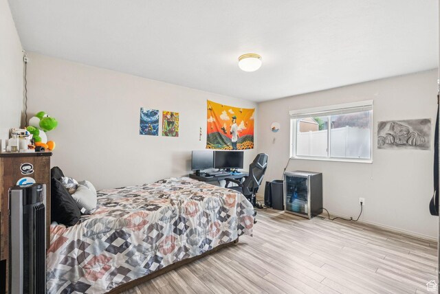 9355 S Peruvian Dr E, Sandy, UT 84093 - bedroom featuring wood finished floors