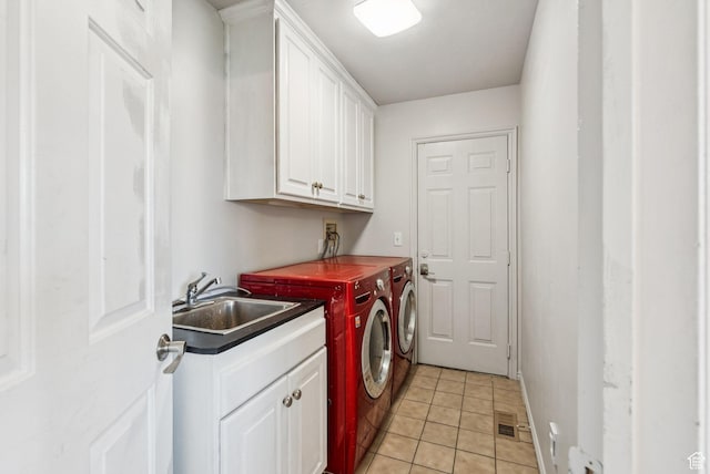 9355 S Peruvian Dr E, Sandy, UT 84093 - laundry area featuring washer and clothes dryer, cabinet space, and light tile patterned floors