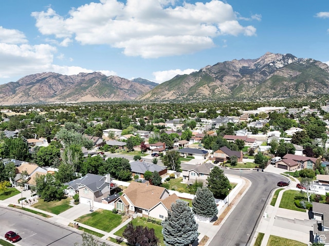 9355 S Peruvian Dr E, Sandy, UT 84093 - aerial view of residential area featuring a mountainous background