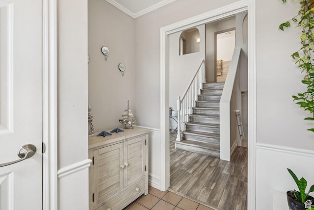 9355 S Peruvian Dr E, Sandy, UT 84093 - stairway featuring crown molding and wood finished floors