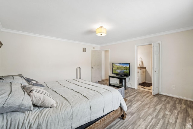 9355 S Peruvian Dr E, Sandy, UT 84093 - bedroom with crown molding, light wood-style floors, and ensuite bathroom
