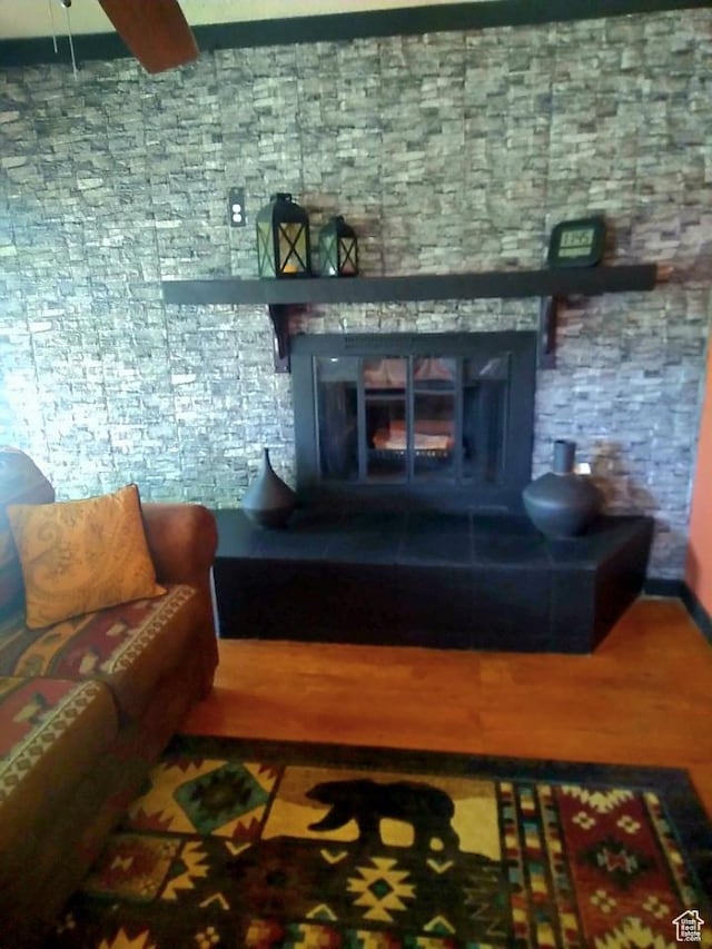 429 Edgehill Dr, Sunnyside, UT 84539 - living room with wood finished floors and a ceiling fan