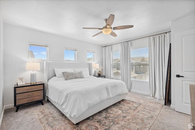 15181 S Sabre Pl, Bluffdale, UT 84065 - bedroom featuring light colored carpet, a textured ceiling, and ceiling fan