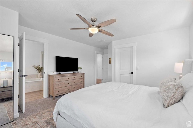 15181 S Sabre Pl, Bluffdale, UT 84065 - carpeted bedroom featuring a ceiling fan and ensuite bathroom