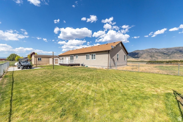 26551 N 8800 W, Portage, UT 84331 - back of property with a wooden deck and a storage unit