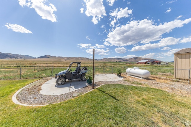26551 N 8800 W, Portage, UT 84331 - view of yard featuring a mountain view, a patio area, and a rural view