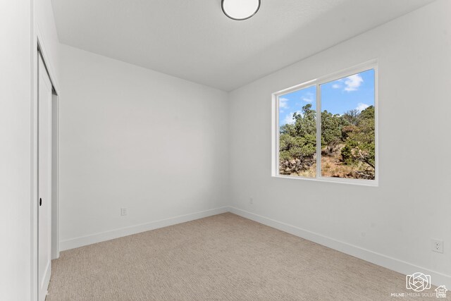 665 E 2015 N Unit 6B, Cedar City, UT 84721 - unfurnished bedroom featuring carpet flooring and a closet