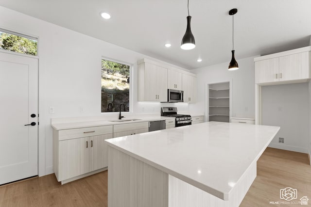 665 E 2015 N Unit 6B, Cedar City, UT 84721 - kitchen featuring stainless steel appliances, light wood-style floors, healthy amount of natural light, light countertops, and recessed lighting