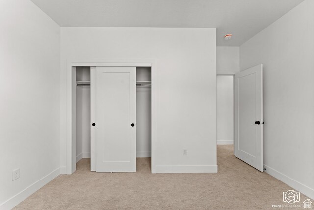 665 E 2015 N Unit 6B, Cedar City, UT 84721 - unfurnished bedroom featuring carpet and a closet