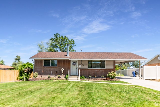 839 E Statice Ave S, Sandy, UT 84094 - ranch-style house featuring an attached carport, concrete driveway, and brick siding