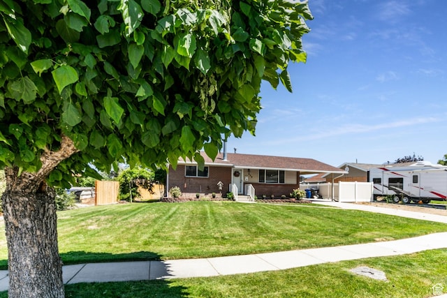839 E Statice Ave S, Sandy, UT 84094 - single story home with brick siding, driveway, and an attached carport