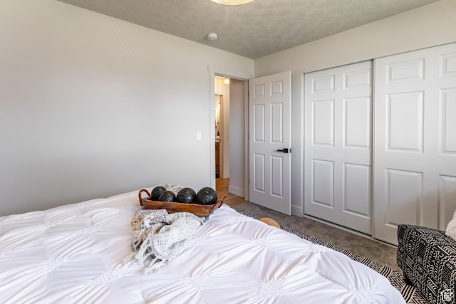 839 E Statice Ave S, Sandy, UT 84094 - carpeted bedroom featuring a closet and a textured ceiling