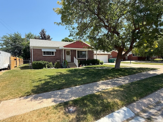 5140 S 2175 W, Roy, UT 84067 - ranch-style home with brick siding, driveway, and a garage