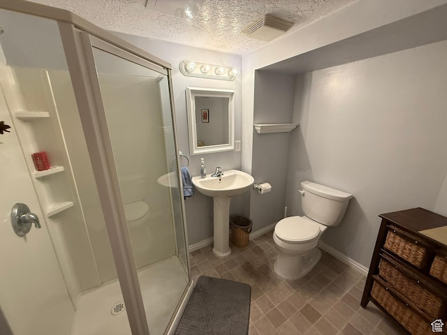 5140 S 2175 W, Roy, UT 84067 - bathroom with a stall shower, a textured ceiling, and tile patterned flooring