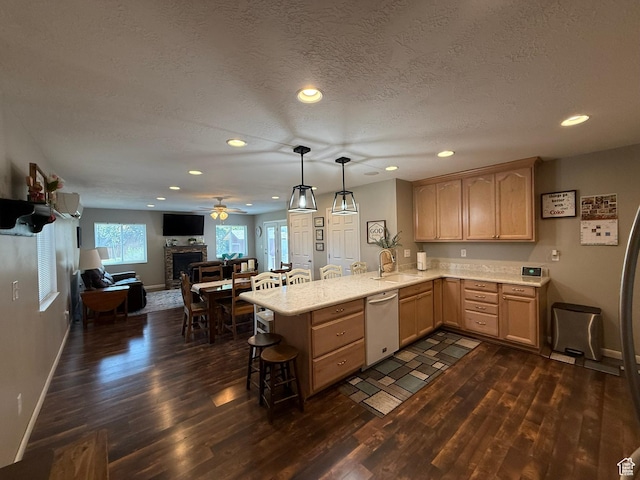 5140 S 2175 W, Roy, UT 84067 - kitchen featuring dishwasher, a peninsula, dark wood-type flooring, recessed lighting, and ceiling fan