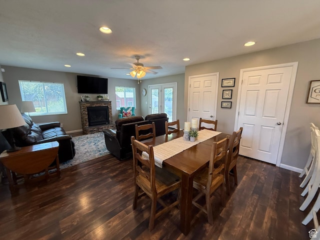5140 S 2175 W, Roy, UT 84067 - dining area featuring dark wood finished floors, recessed lighting, a fireplace, and a ceiling fan