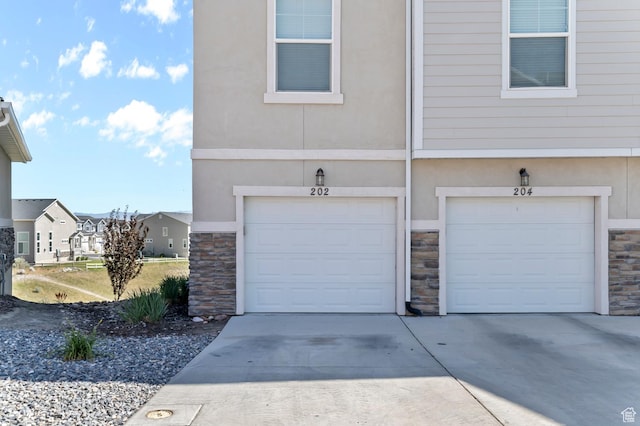 14643 S Mckellen Dr Unit D202, Herriman, UT 84096 - garage with driveway