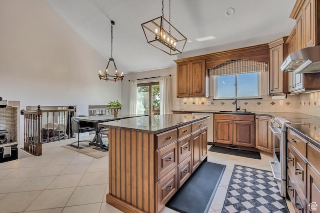 2140 E 3000 N, Layton, UT 84040 - kitchen featuring appliances with stainless steel finishes, extractor fan, a chandelier, tasteful backsplash, and pendant lighting