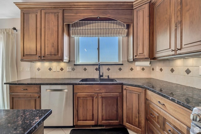 2140 E 3000 N, Layton, UT 84040 - kitchen featuring dishwasher, decorative backsplash, dark stone counters, light tile patterned floors, and stove