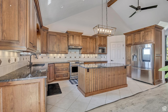 2140 E 3000 N, Layton, UT 84040 - kitchen featuring appliances with stainless steel finishes, beamed ceiling, brown cabinets, high vaulted ceiling, and dark stone counters
