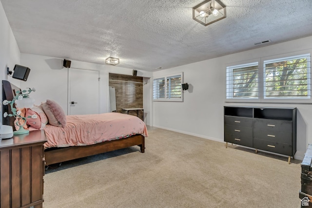 2140 E 3000 N, Layton, UT 84040 - bedroom featuring a textured ceiling, multiple windows, and carpet
