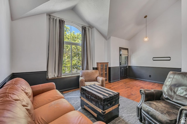 2140 E 3000 N, Layton, UT 84040 - living room featuring vaulted ceiling and wood finished floors