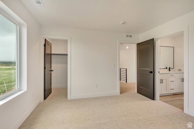 1344 N 1525 E Unit 73, Payson, UT 84651 - unfurnished bedroom featuring light carpet, ensuite bath, and a walk in closet