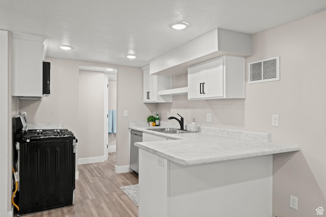 791 W 100 S, Provo, UT 84601 - kitchen with gas range oven, open shelves, dishwasher, a peninsula, and light wood-style flooring