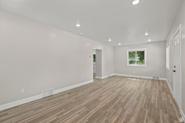 791 W 100 S, Provo, UT 84601 - empty room with light wood-style floors and recessed lighting