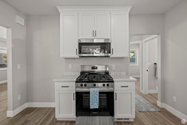 791 W 100 S, Provo, UT 84601 - kitchen featuring stainless steel appliances, light wood-type flooring, and light countertops