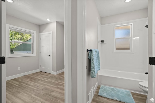 791 W 100 S, Provo, UT 84601 - bathroom with wood finished floors, shower / tub combination, and recessed lighting