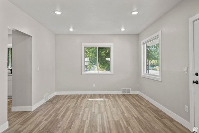 791 W 100 S, Provo, UT 84601 - empty room with healthy amount of natural light, light wood-type flooring, and recessed lighting