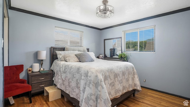 2075 Sorrento Dr, Woods Cross, UT 84087 - bedroom featuring crown molding and wood finished floors