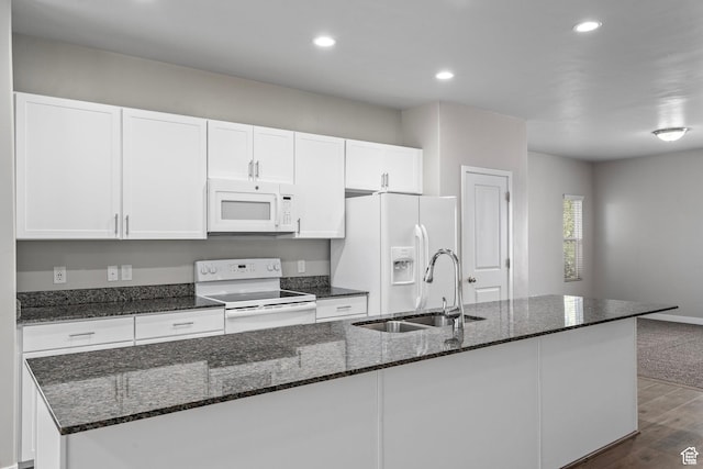 14728 S Rising Star Way W, Bluffdale, UT 84065 - kitchen featuring white appliances, white cabinets, dark wood-style floors, an island with sink, and recessed lighting